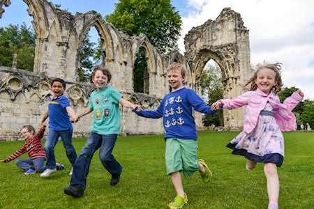 group of children running around and having fun