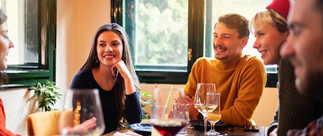 Group of friends enjoying drinks and a chat