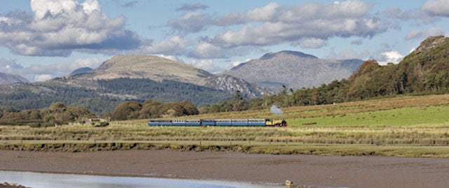 Steam train crossing the countryside