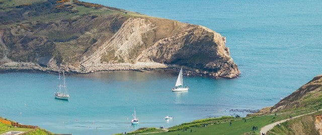 Sail boats at Lulworth cove