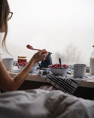 Eating breakfast with a view over an open landscape