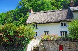 Devon Cottages to Fall in Love With A traditional white washed stone cottage in Devon you'll love