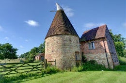 Little Boy Court Oast in Kent View of a traditional Oast house in Kent