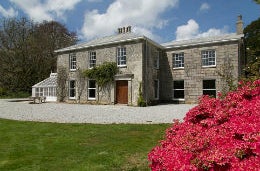 Beautiful rhododendrons in bloom at Burncoose House Burncoose House in mid Cornwall