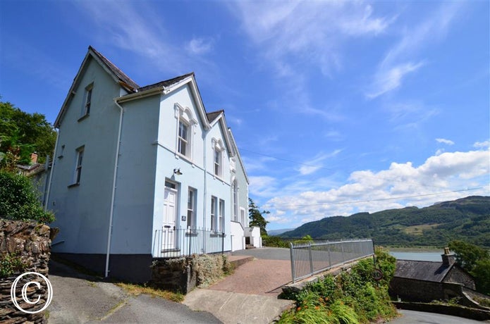 Bryn Hyfryd is an imposing Victorian house in a stunning location overlooking the Mawddach Estuary at Bontddu